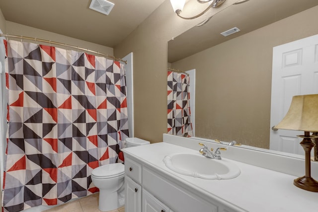 bathroom featuring vanity, tile patterned flooring, toilet, and a shower with curtain