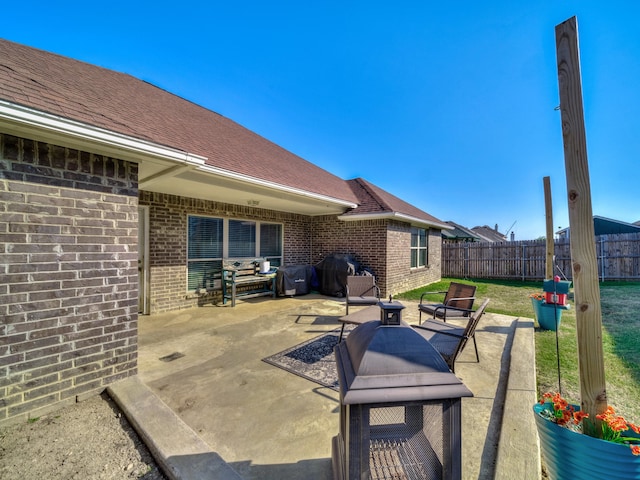 view of patio with a grill