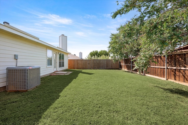 view of yard with central AC unit