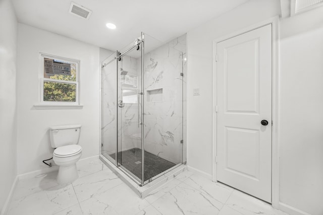 bathroom with walk in shower and toilet