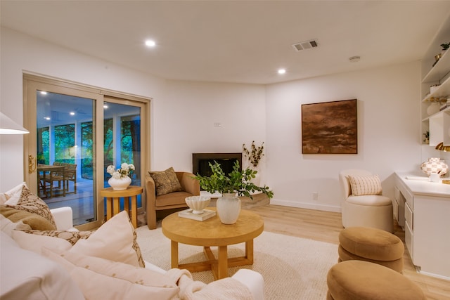 living room with light hardwood / wood-style floors