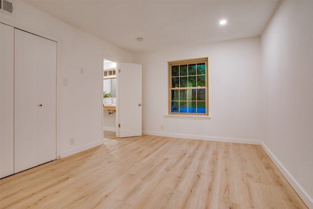 unfurnished bedroom featuring light hardwood / wood-style flooring