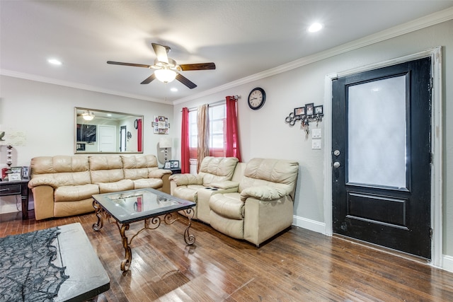 living room featuring ornamental molding, hardwood / wood-style floors, and ceiling fan