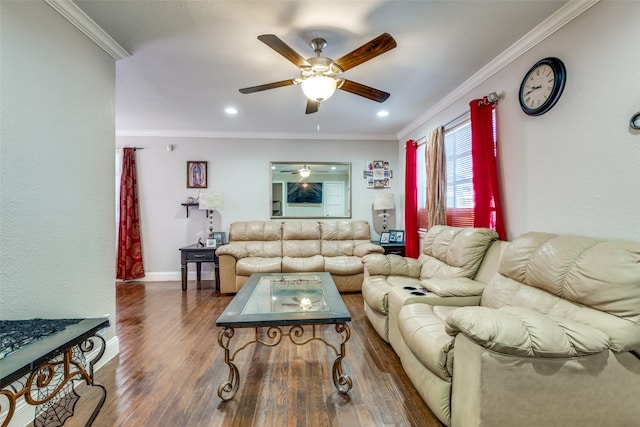 living room with ornamental molding, ceiling fan, and wood-type flooring