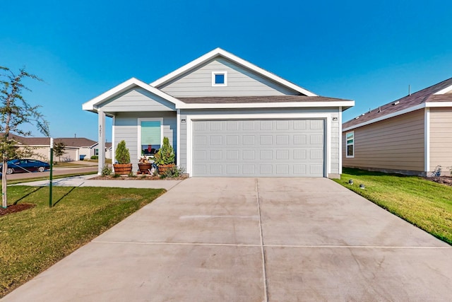 ranch-style home featuring a garage and a front yard