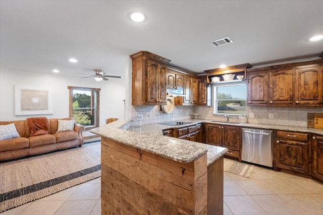 kitchen with dishwasher, black electric stovetop, kitchen peninsula, backsplash, and light tile patterned flooring