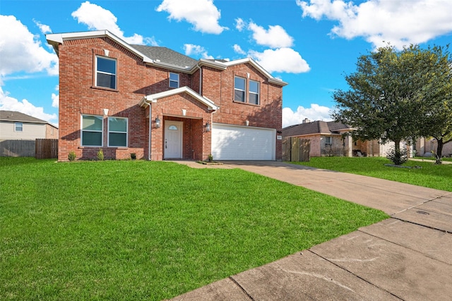 view of front of property with a front yard and a garage