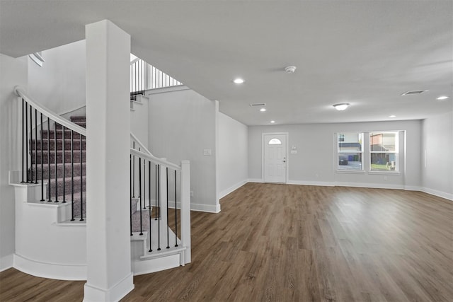 foyer entrance featuring hardwood / wood-style floors