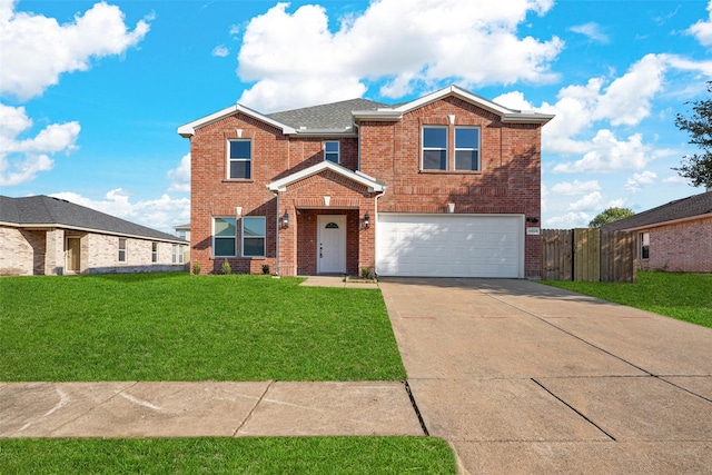 front of property featuring a front lawn and a garage