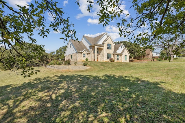 view of front of property with a front yard