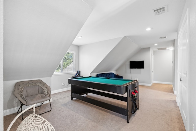 rec room featuring light carpet, lofted ceiling, and pool table