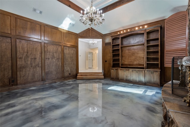 unfurnished living room with beam ceiling, a chandelier, and wooden walls