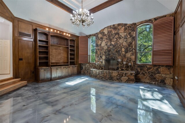 interior space with ceiling fan and lofted ceiling with skylight