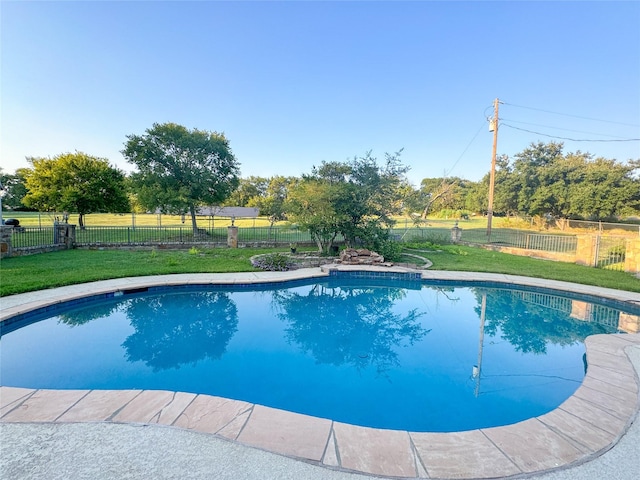 view of pool featuring a fenced in pool and a fenced backyard