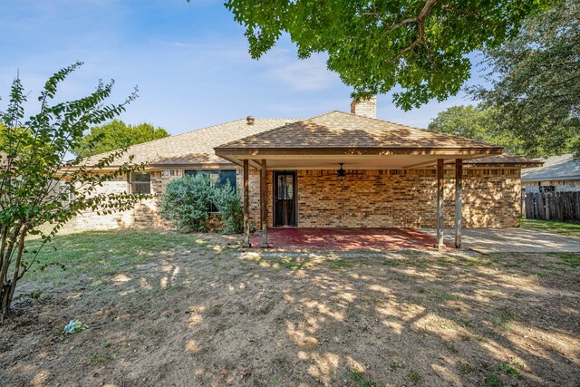 rear view of house with a patio