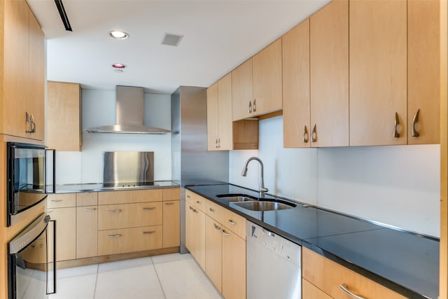 kitchen with light brown cabinets, sink, wall chimney range hood, dishwasher, and cooktop