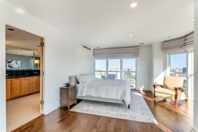 bedroom featuring hardwood / wood-style flooring