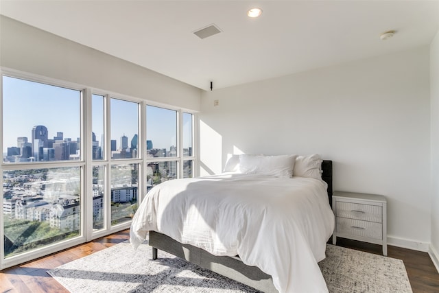 bedroom featuring wood-type flooring