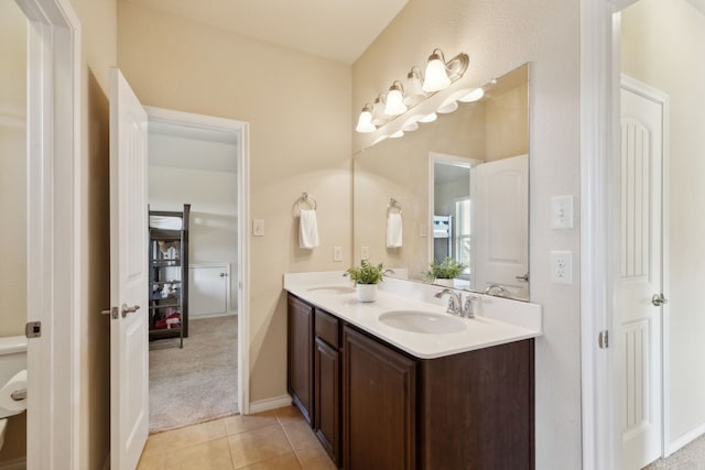 bathroom with vanity and tile patterned floors