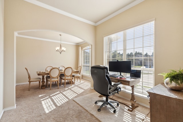 carpeted home office featuring a notable chandelier, a wealth of natural light, and crown molding