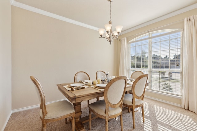 dining room featuring ornamental molding, plenty of natural light, and an inviting chandelier