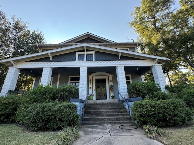 view of front of home featuring covered porch