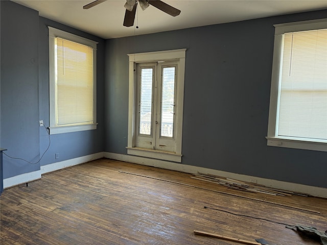 unfurnished room featuring hardwood / wood-style floors and ceiling fan