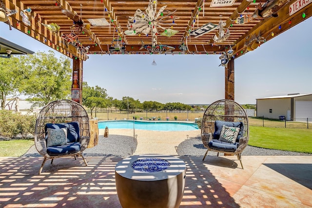 view of patio with a fenced in pool, a fire pit, and a pergola