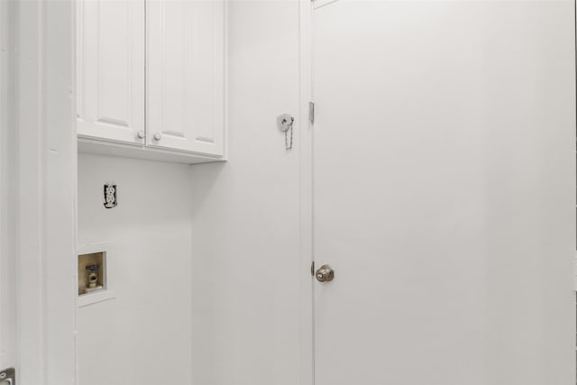 laundry room featuring cabinets and hookup for a washing machine