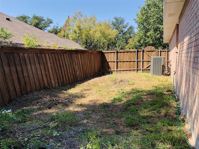 view of yard featuring central AC