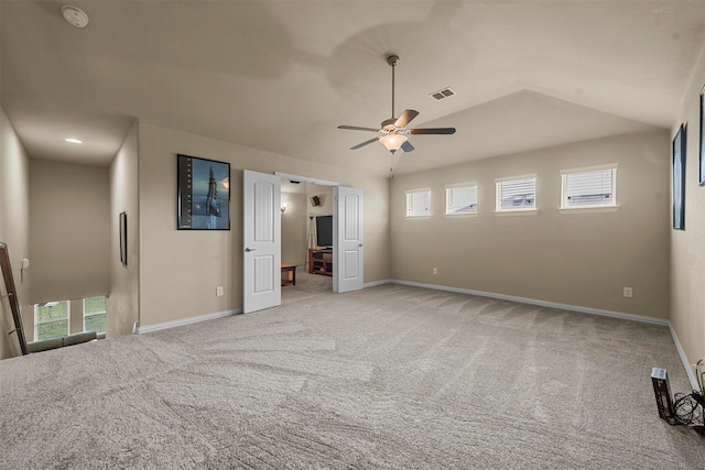 unfurnished bedroom with light carpet and ceiling fan