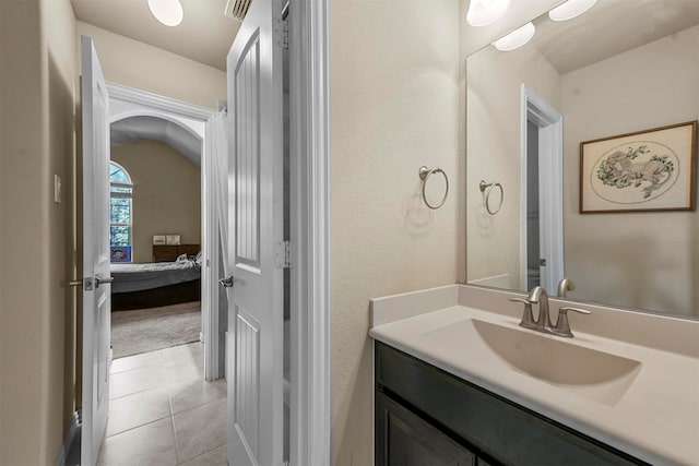 bathroom with vanity and tile patterned floors