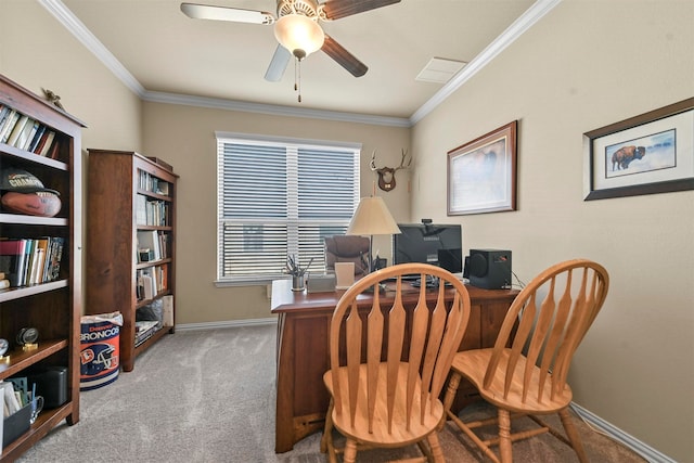 carpeted office space with ornamental molding and ceiling fan