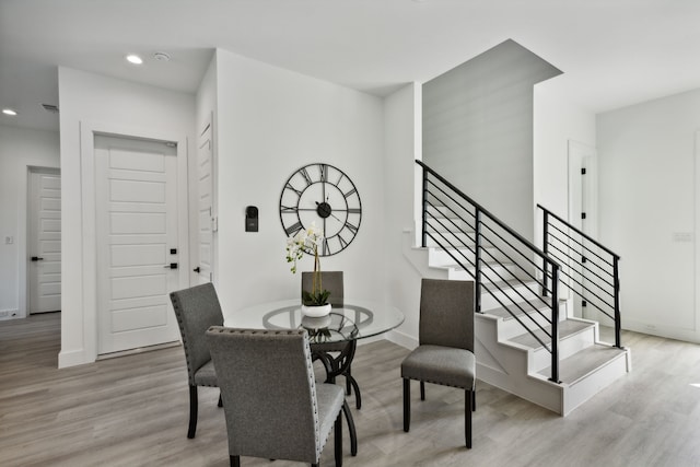 dining area with light wood-type flooring