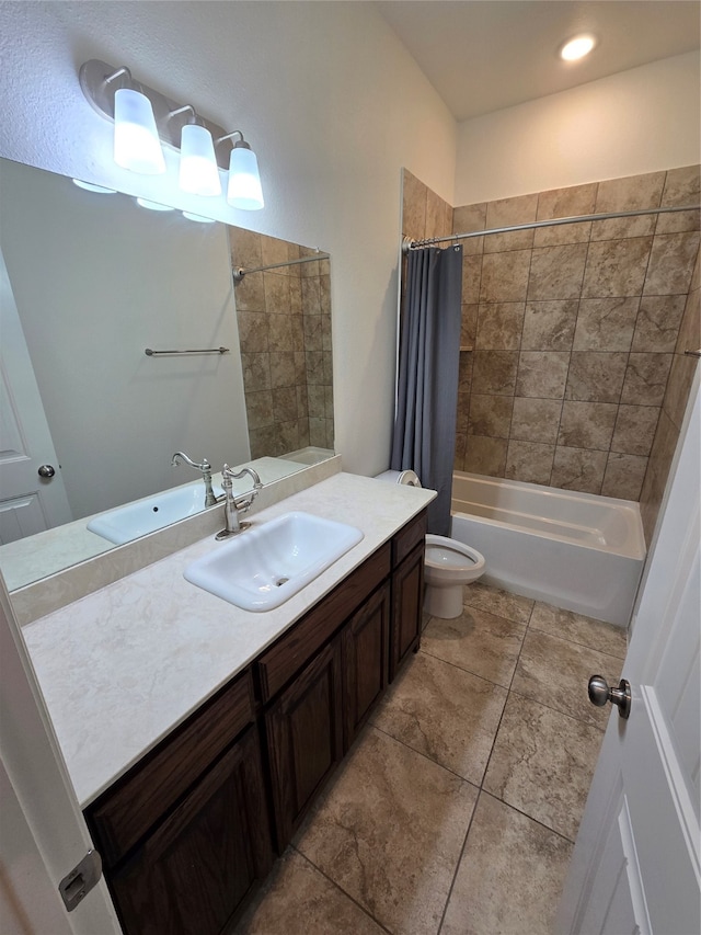 full bathroom with shower / bath combination with curtain, tile patterned flooring, vanity, and toilet