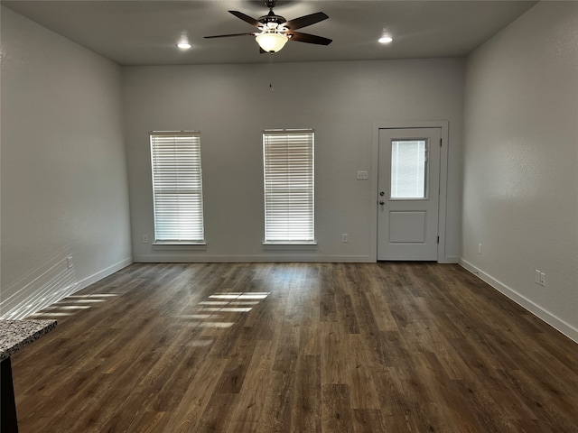 entryway with ceiling fan and dark hardwood / wood-style floors