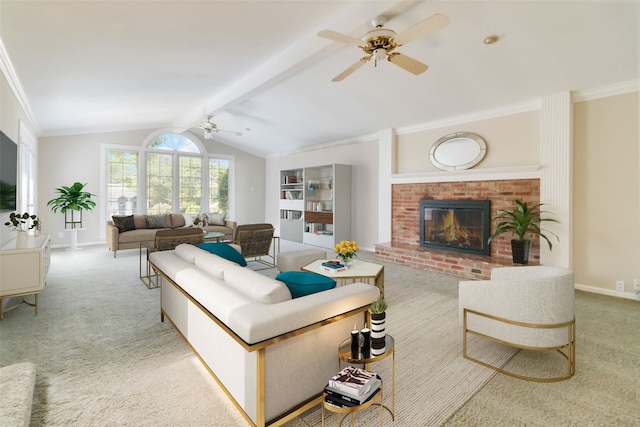 living room featuring vaulted ceiling with beams, a fireplace, light carpet, ceiling fan, and crown molding