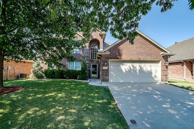 front facade with a garage and a front yard