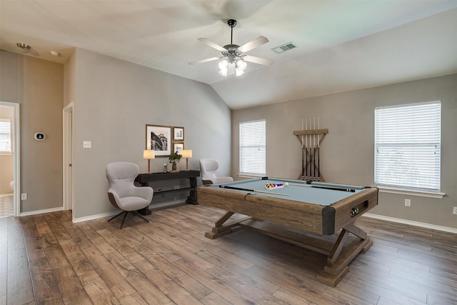 recreation room featuring ceiling fan, lofted ceiling, plenty of natural light, and hardwood / wood-style floors