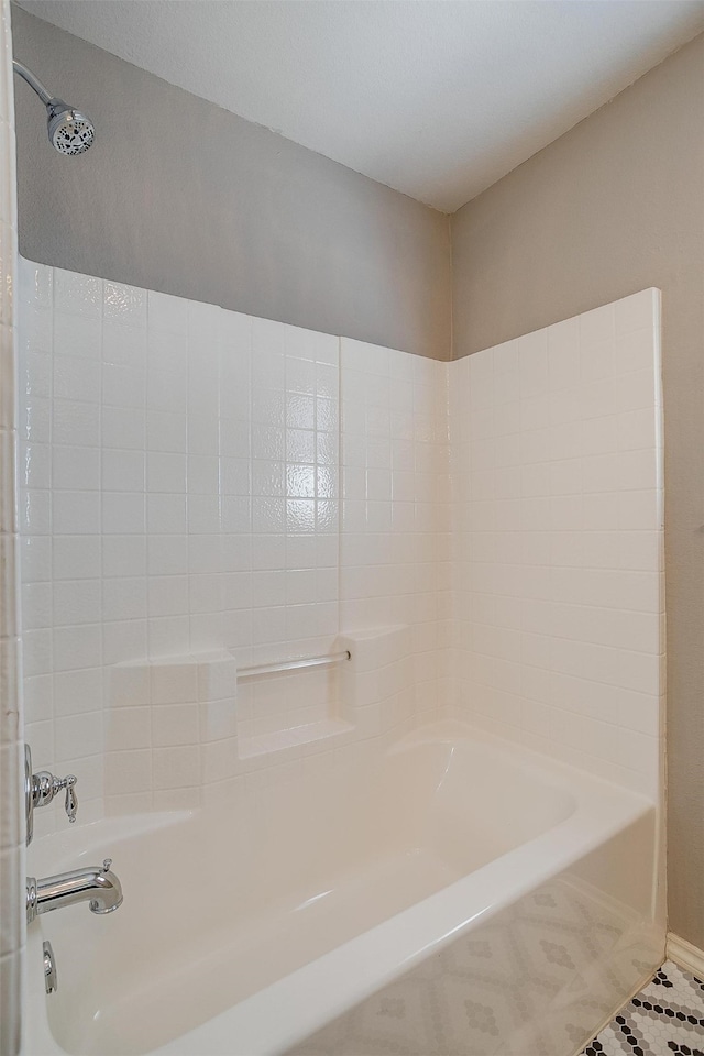 bathroom with shower / bathtub combination and tile patterned flooring