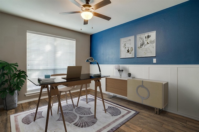 office with wood-type flooring and ceiling fan