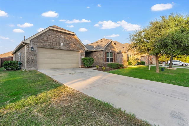 view of front facade featuring a garage and a front yard