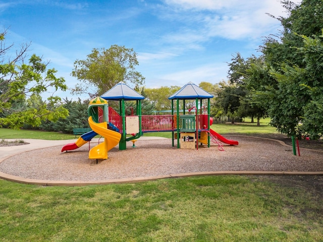 view of play area featuring a lawn