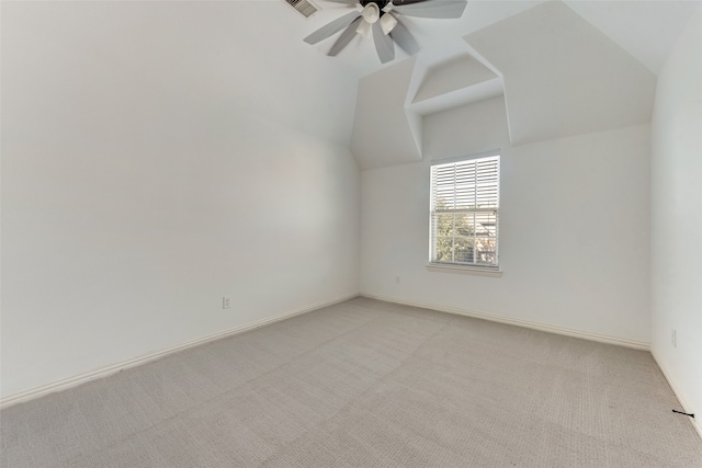 bonus room with ceiling fan, light colored carpet, and vaulted ceiling