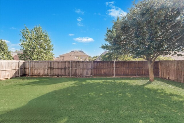 5625 Granada Dr, Mckinney, TX 75071 - view of yard featuring a fenced backyard