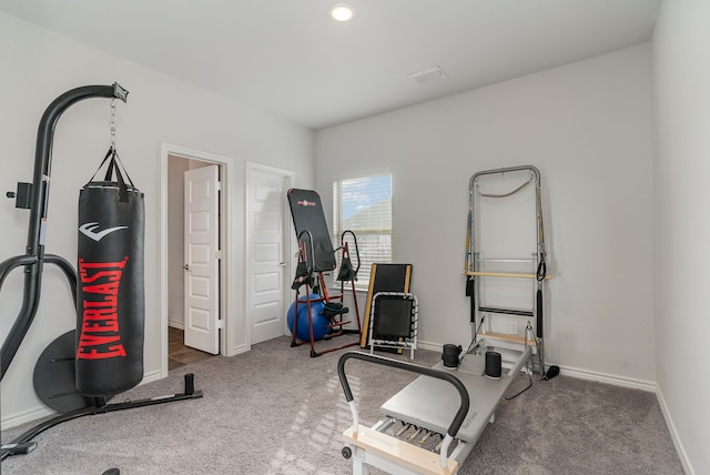 exercise room with carpet floors