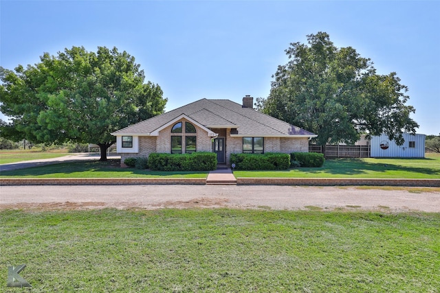 view of front of house with a front lawn