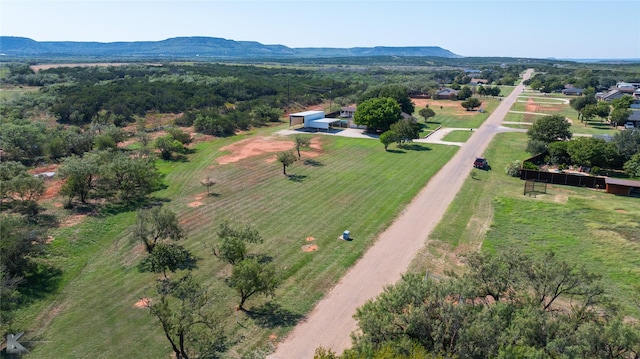 aerial view featuring a mountain view and a rural view