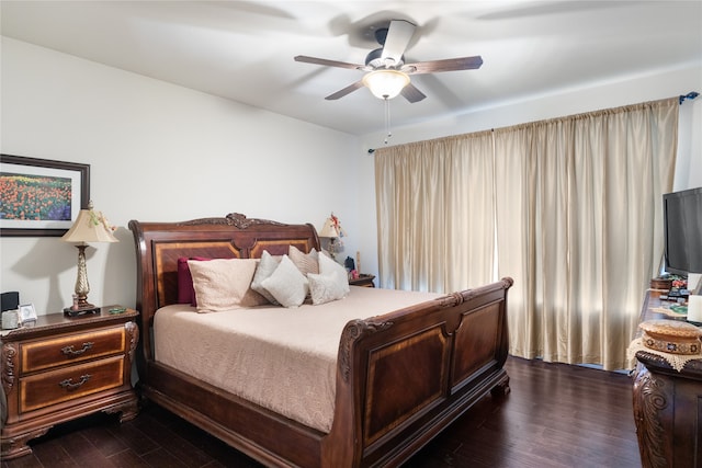 bedroom with dark wood-type flooring and ceiling fan