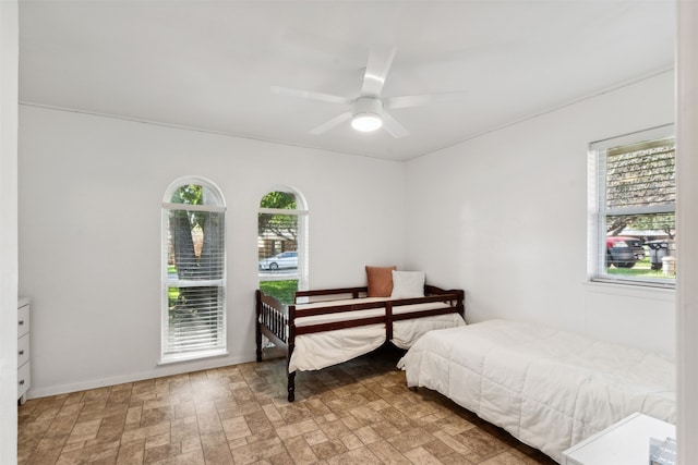 bedroom featuring ceiling fan